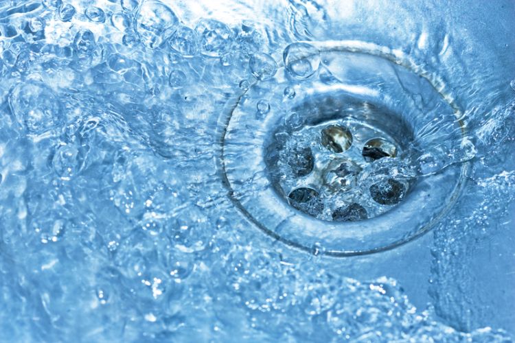 Close-up of water running down a kitchen sink