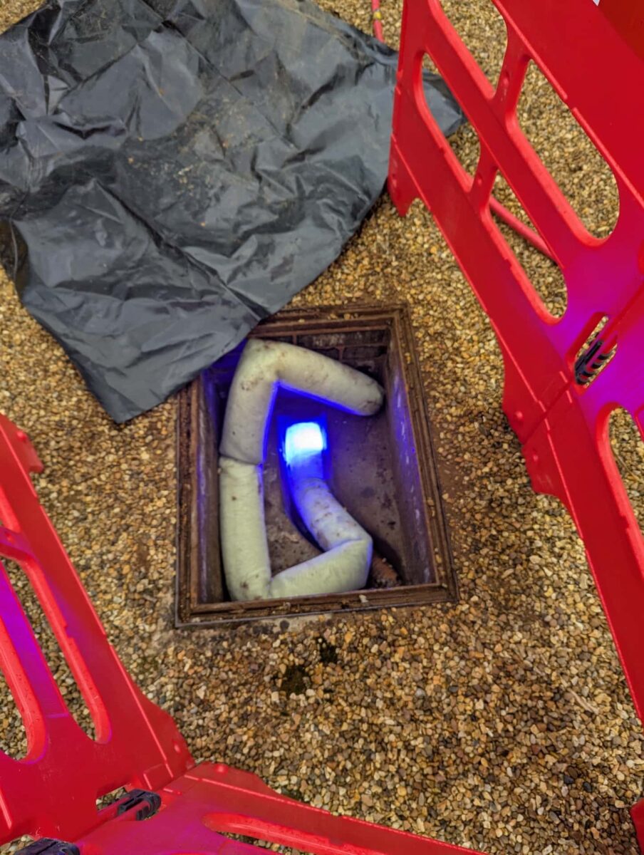 Blue light lining repair on broken drain