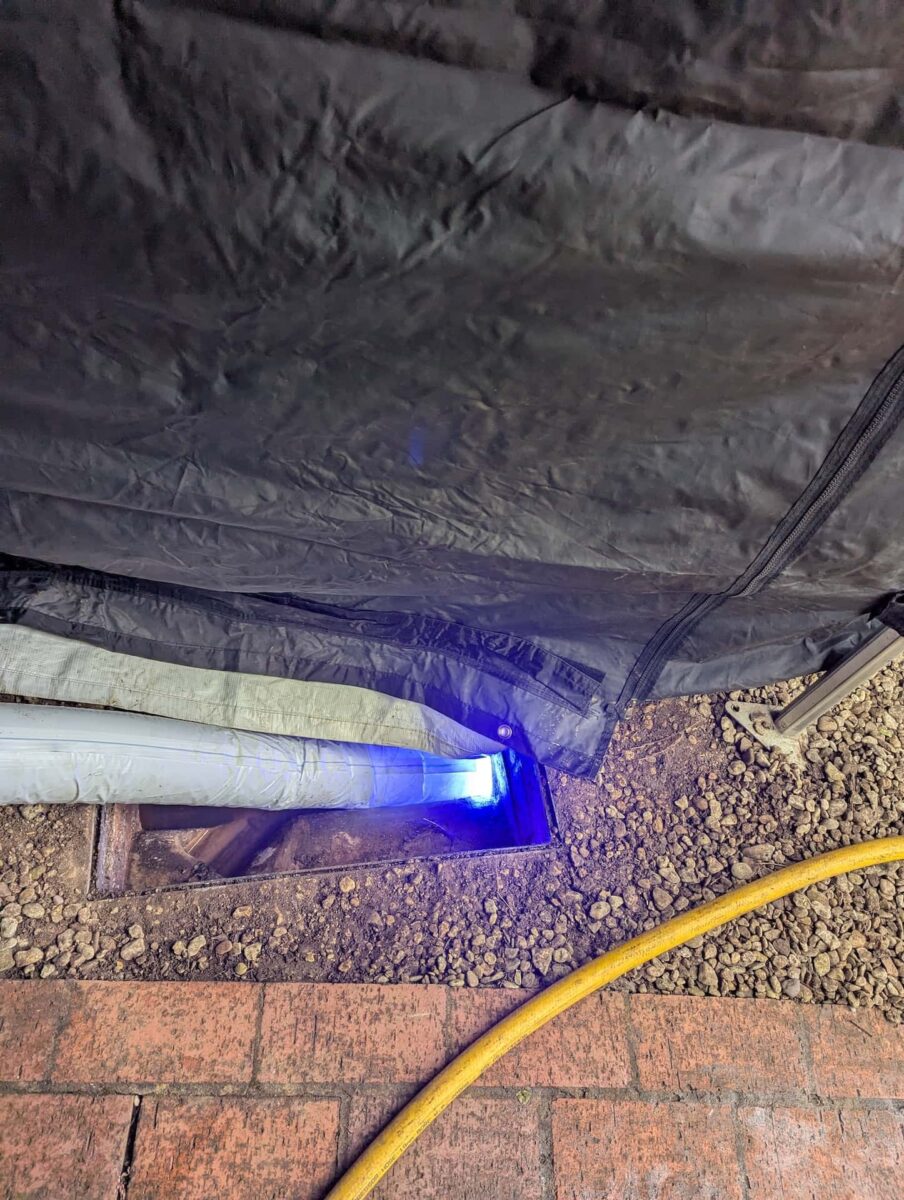 Blue light lining repair on broken drain