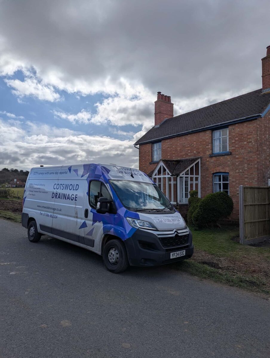 Cotswold Drainage van outside a home