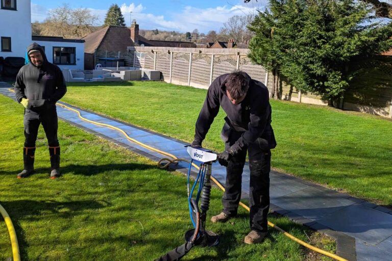 Geo injection and soil aeration on a garden lawn