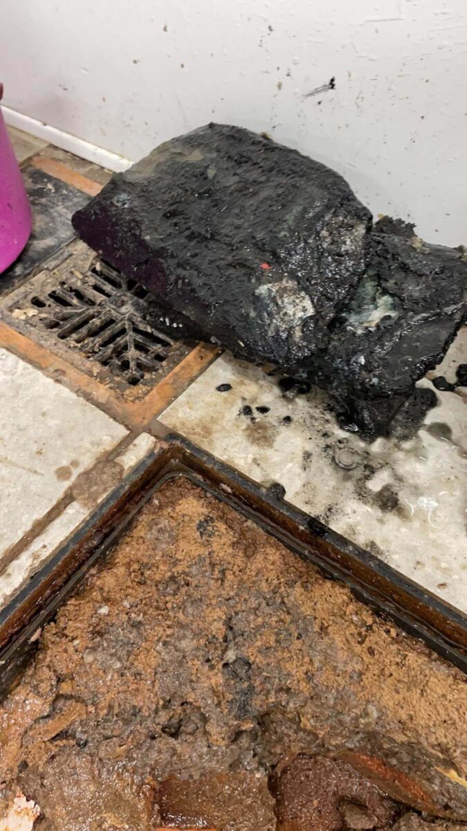 Block of fail oil and grease that had blocked a drain